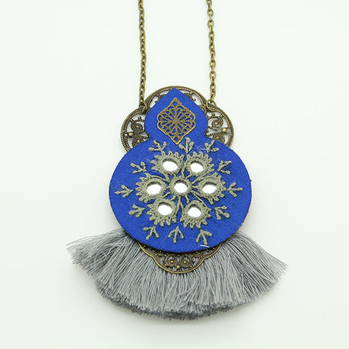 #PersianEmbroideredNecklace #HandmadeJewelry #TraditionalCraftsmanship #ElegantDesigns #CulturalInspiration #UniqueAccessories #ArtisanalNecklaces #ExquisiteEmbroidery #PersianArtistry #StatementJewelry