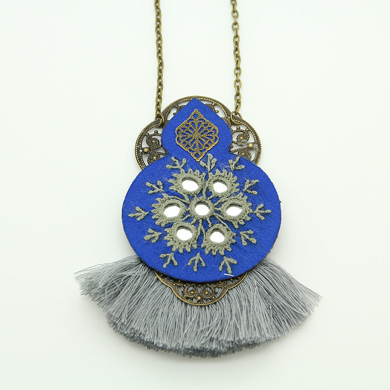 #PersianEmbroideredNecklace #HandmadeJewelry #TraditionalCraftsmanship #ElegantDesigns #CulturalInspiration #UniqueAccessories #ArtisanalNecklaces #ExquisiteEmbroidery #PersianArtistry #StatementJewelry